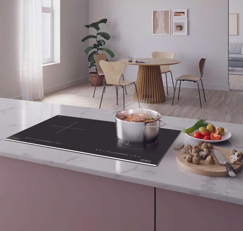 Nồi inox trên bếp từ trong căn bếp
